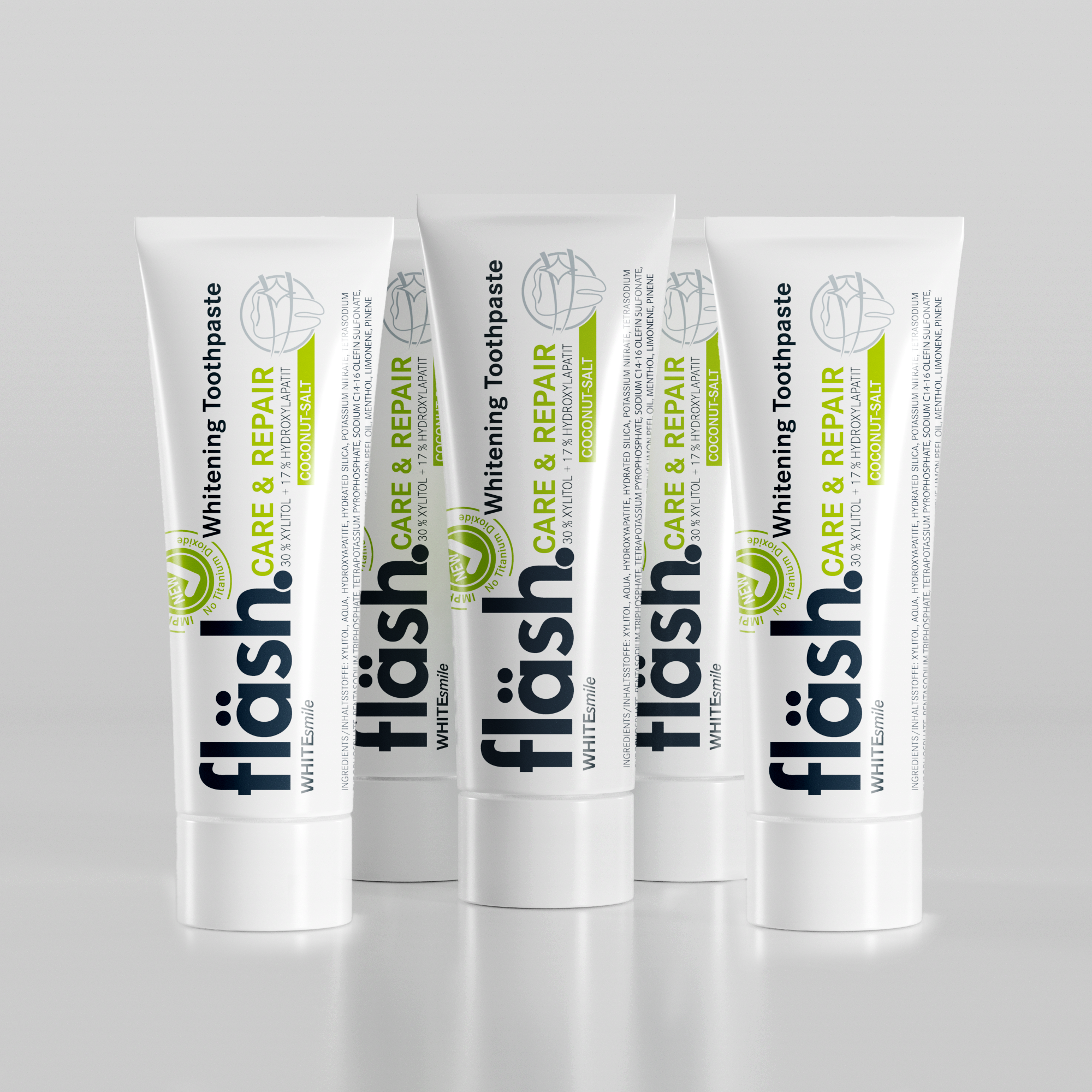 Fünf Tuben fläsh Zahnpasta der Sorte Kokos-Salz auf hellgrauem Hintergrund. Auf den Tuben steht neben dem schwarzen Fläsh Logo die Beschreibung: "fläsh care and Repair Whitening Toothpaste"