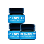Drei Glastiegel bluedenta cäre Lippenpflege auf transparentem Hintergrund.  