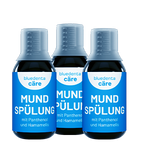 Drei Flaschen bluedenta cäre Mundspülung auf transparentem Hintergrund.  
