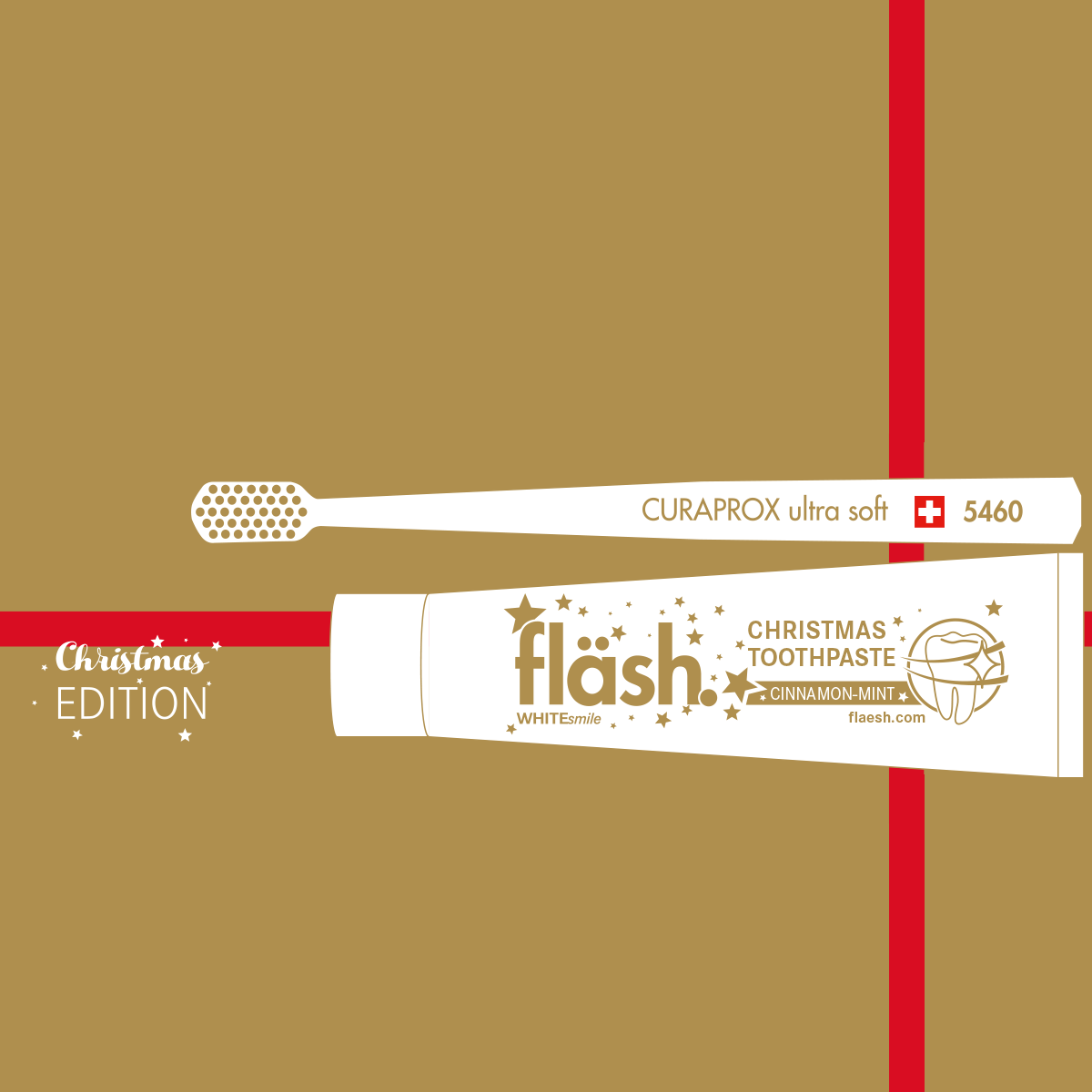 Auf goldenem HIntergrund liegt das fläshWeihnachts-Set, bestehend aus der weissen Tube fläsh xmas Zahnpasta mit Zimtgeschmack und passender, weisser  Handzahnbürste.